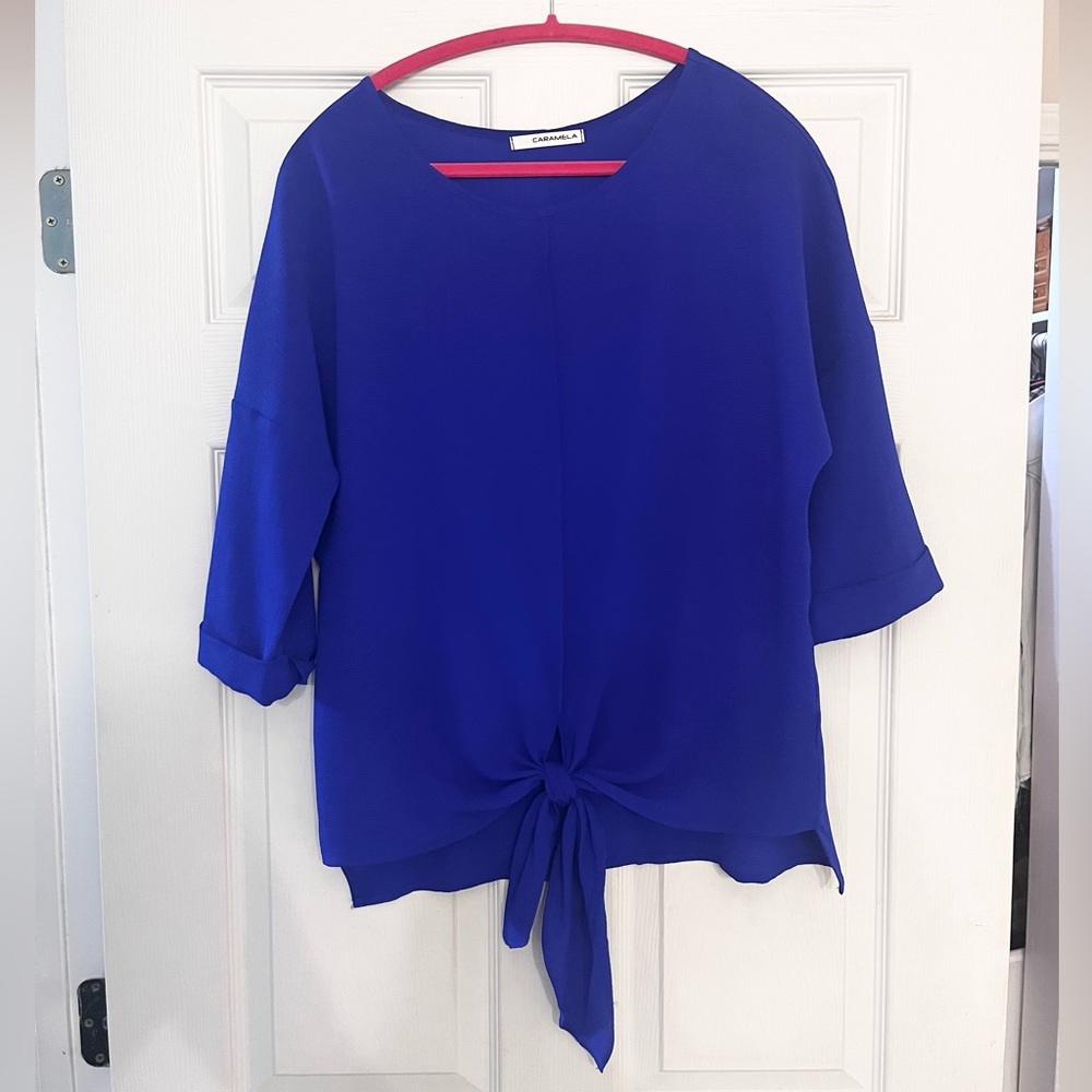 Blue blouse with tie front detail. Size small